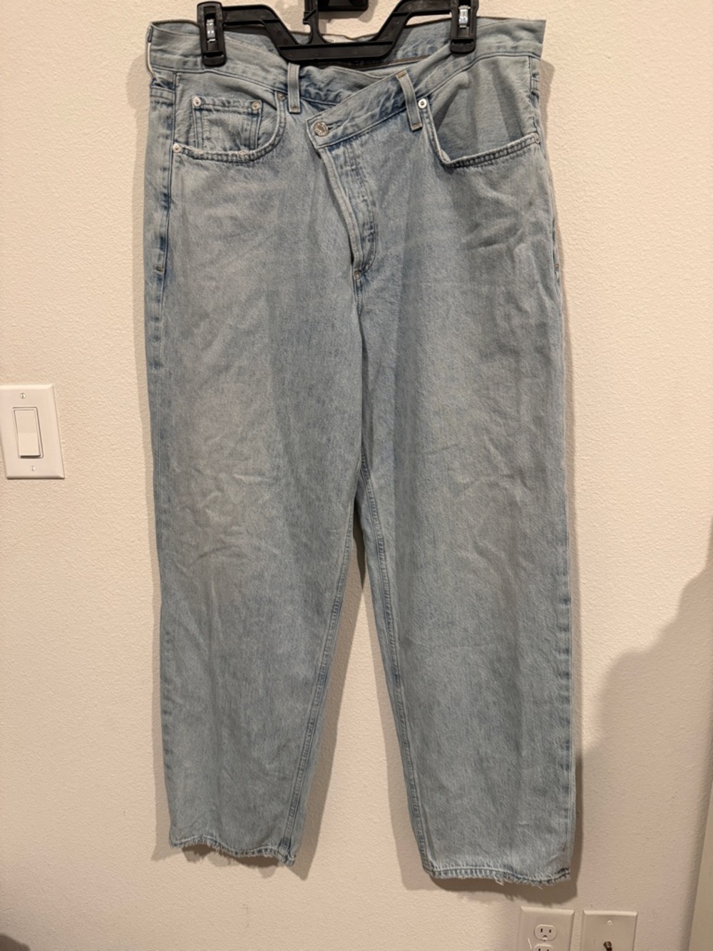 AGOLDE Criss Cross light wash denim jeans